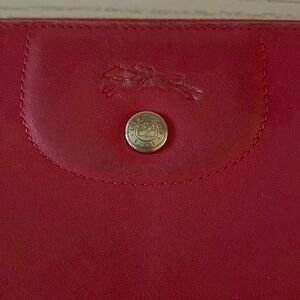 Longchamp Euro wallet. Fabulous red! Some wear on corners-shown in photos.